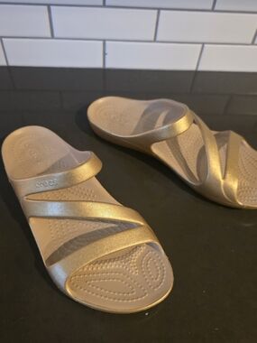Crocs Women’s Gold Metallic Sandals